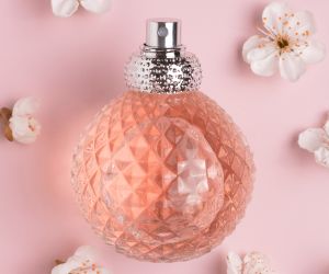 Perfume bottle and white flowers, envato