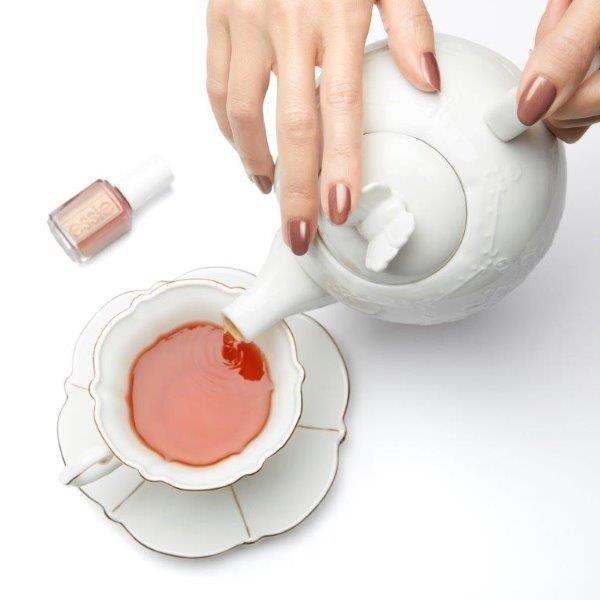 ESSIE-enamel-TeacupHalfFull-lifestyle-OnHand (1).jpg