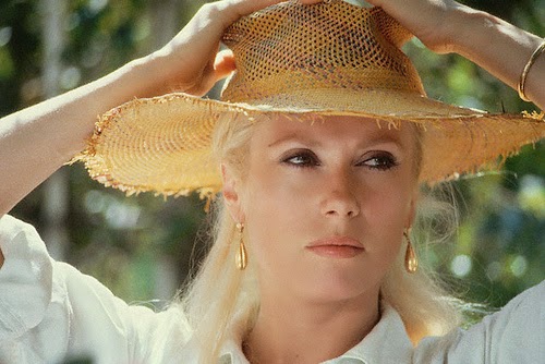23-catherine-deneuve-wicker-rattan-straw-summer-2014-habituallychic.jpg
